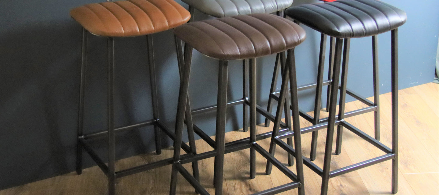 Geniune leather industrial bar stools. We offer this stool in red leather, brown leather and black leather